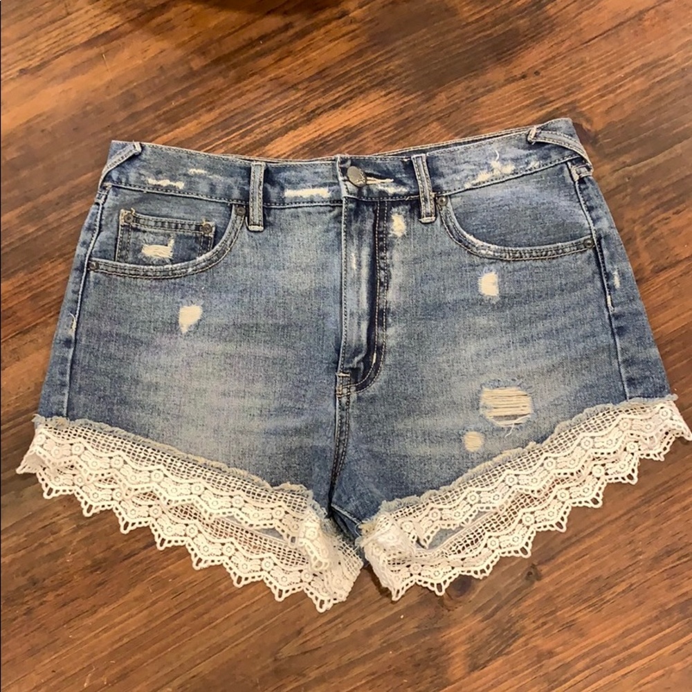 Free People denim shorts with lace trim